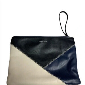 Nautica tri colored clutch.  Black, creams and navy on front solid black back